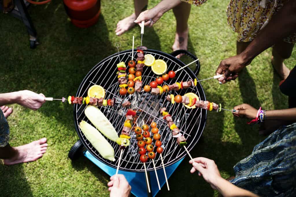 skewers over a barbeque